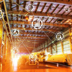 indústria 4.0 - imagem de uma indústria e sobre a imagem vários ícones que se conectam representando o conceito 4.0