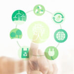 ESG - imagem de um dedo tocando um ícone cercado por símbolos que remetem aos pilares da ESG