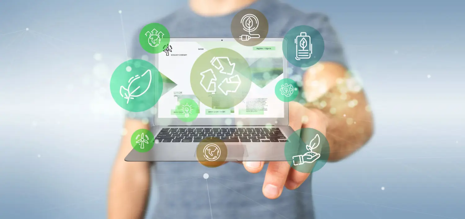 sustentabilidade na cadeia de suprimentos - imagem de uma pessoa apontando para um notebook e sobre ele ícones que representam sustentabilidade e supply chain